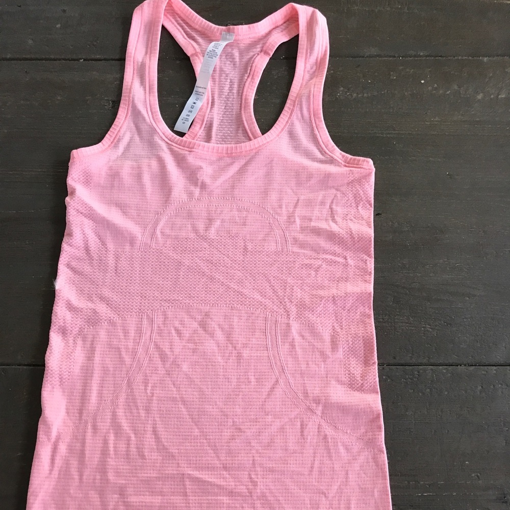 Bright pink Lululemon tank